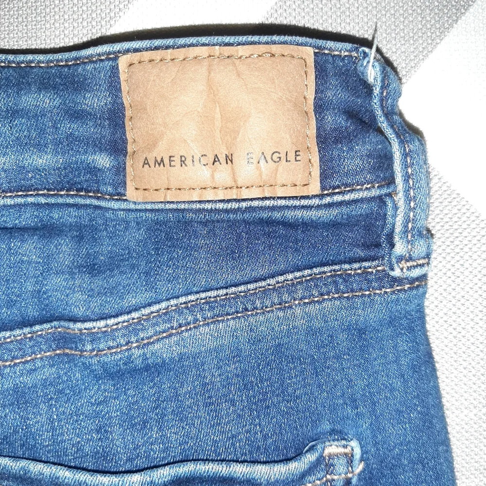 American Eagle Outfitters Dark Blue High Rise Jegging Next Level Stretch 6 Short - Picture 3 of 4